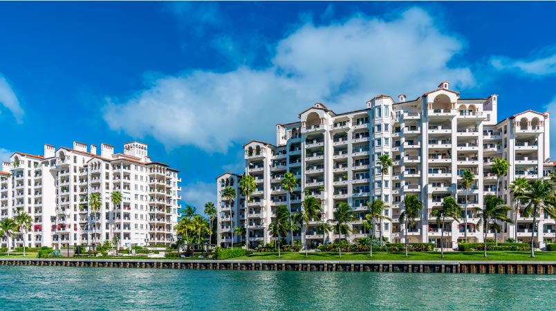 A row of massive waterfront condo buildings in Florida.