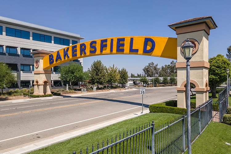 The Bakersfield sign over the road toward downtown