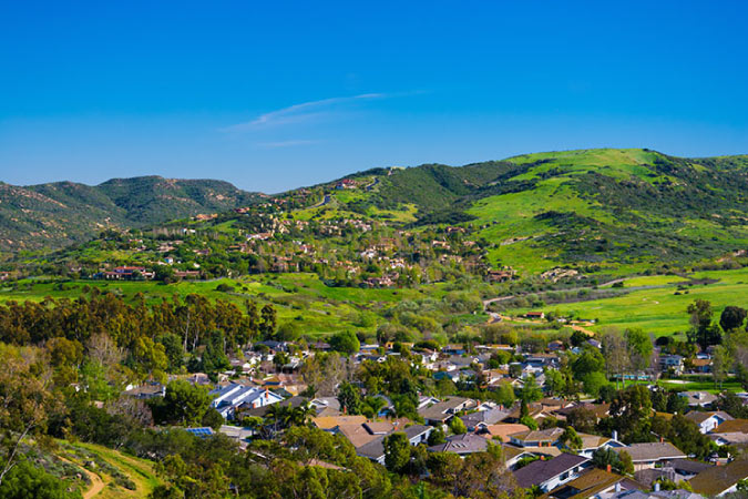 Residential neighborhoods are nestled in the green hills of Irvine in Orange County, California.