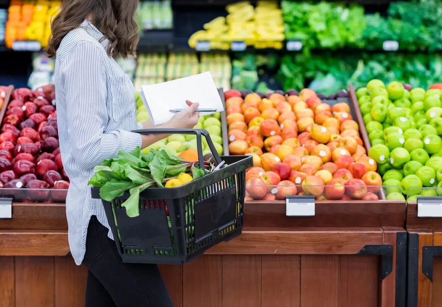 young woman shopping for healthy foods