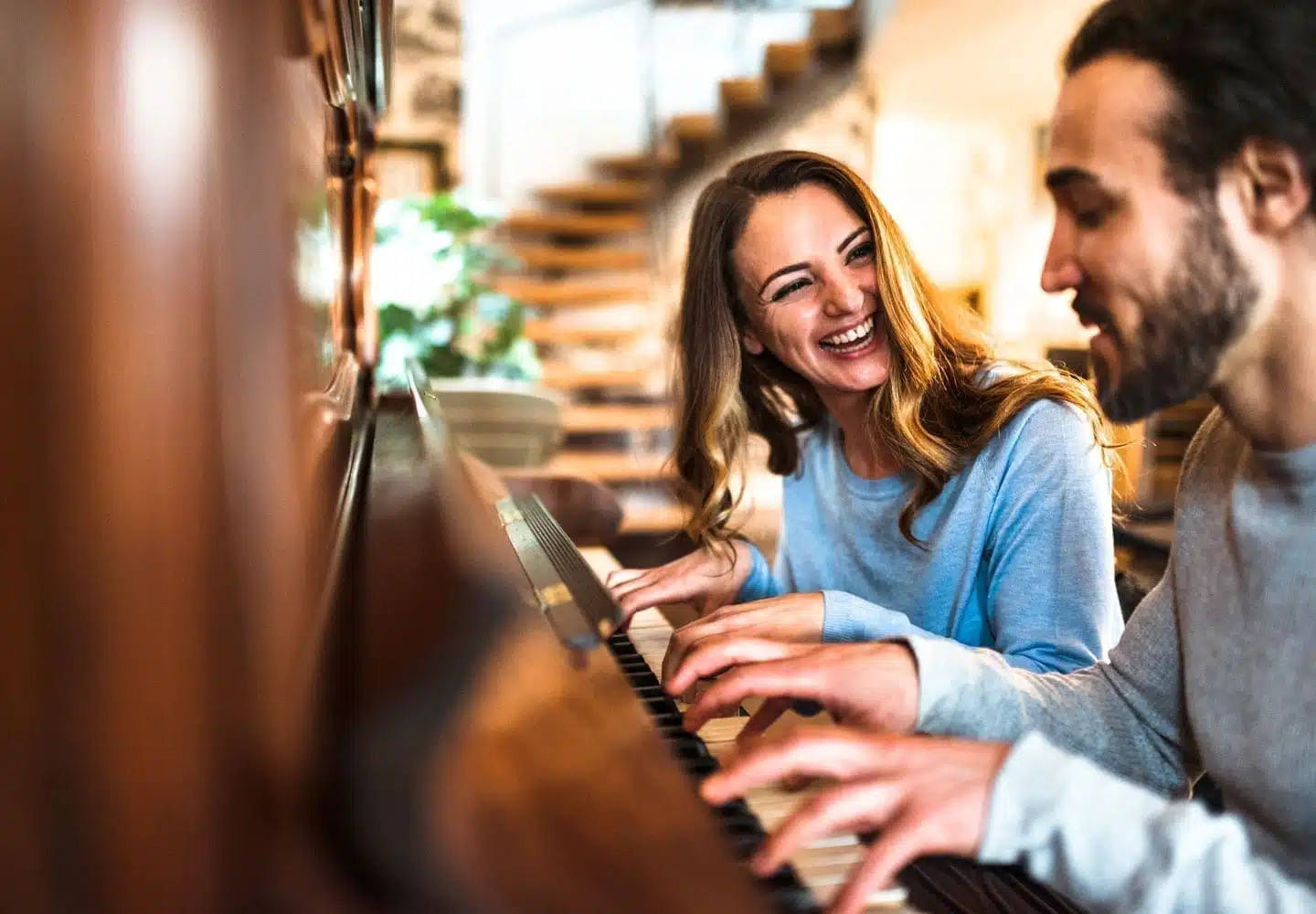 couple playing piano