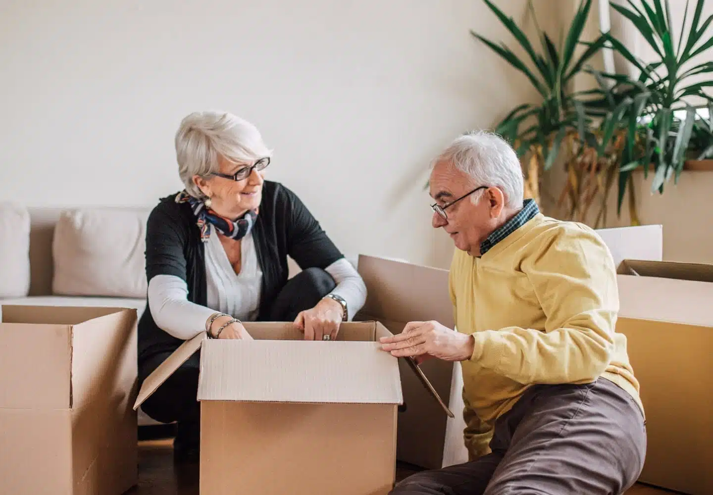 Elderly couple packing