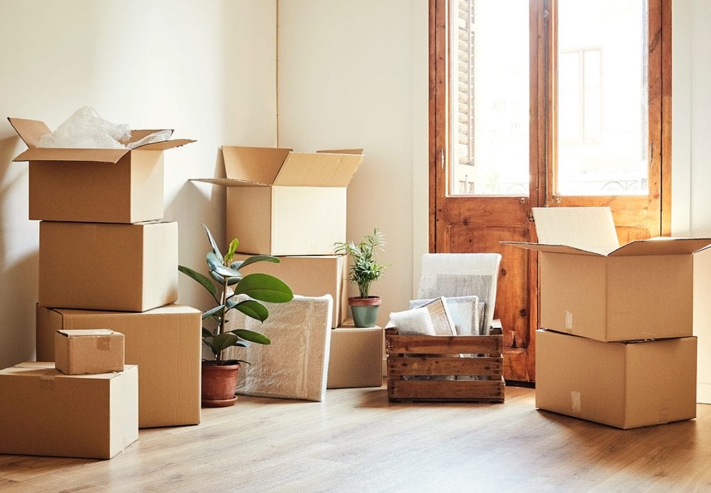 Things packed in moving boxes and stored at a friend's house during a home remodel