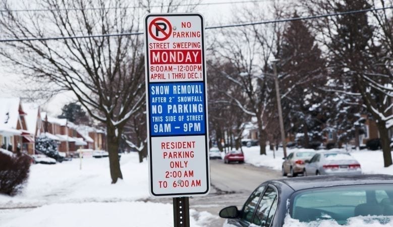 No Parking Signs on Chicago street in winter