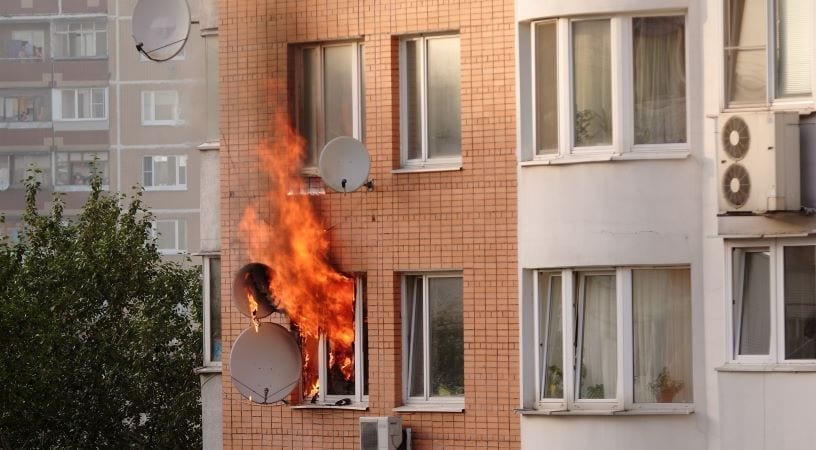 fire coming out of an apartment window