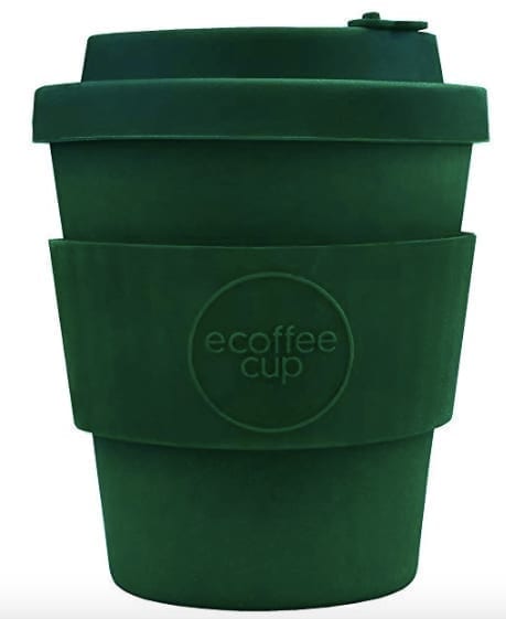 a reusable coffee cup with a lid and sleeve