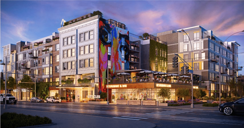 The City Club Apartments building and a local restaurant and bar in Kansas City, Missouri, at dusk. The new buildings are shining in the fading light.