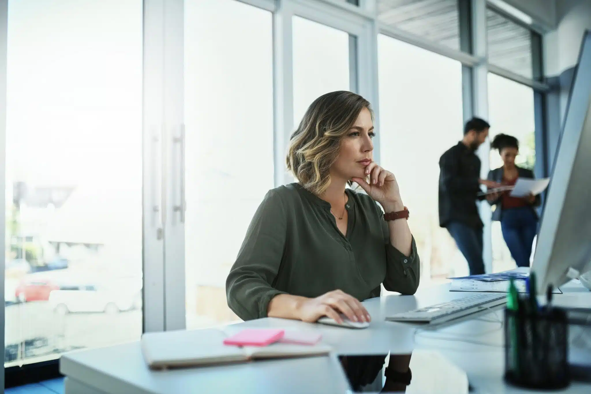 woman taking video meeting in kitchen