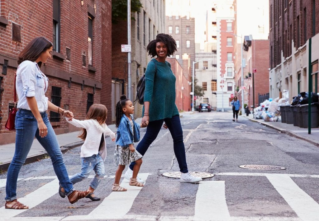 NYC moms walking with their daughters