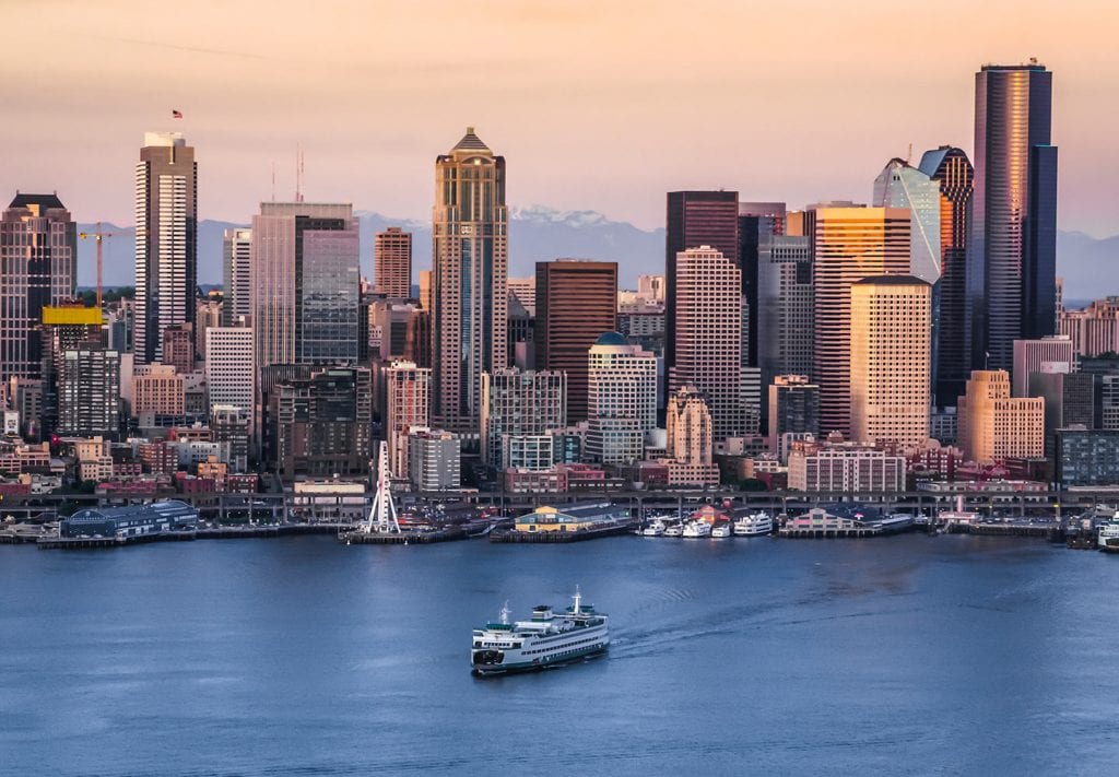 A ferry sailing away from Seattle