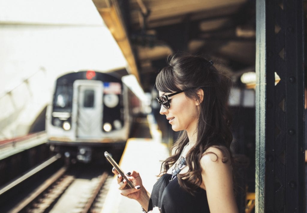 A person holding a camera
Description automatically generated