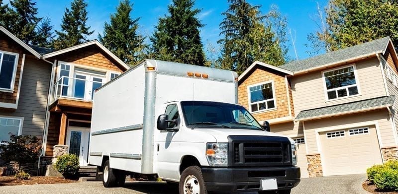 Moving truck in front of home