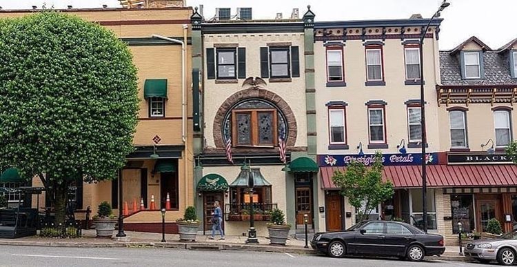 Street-level view of some of the shops along charming Fayette Street in Conshohocken (aka "Conshy"), Pennsylvania — a suburb of Philadelphia.