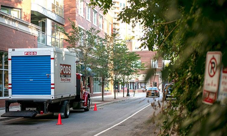 A PODS City Service truck and container in downtown Chicago