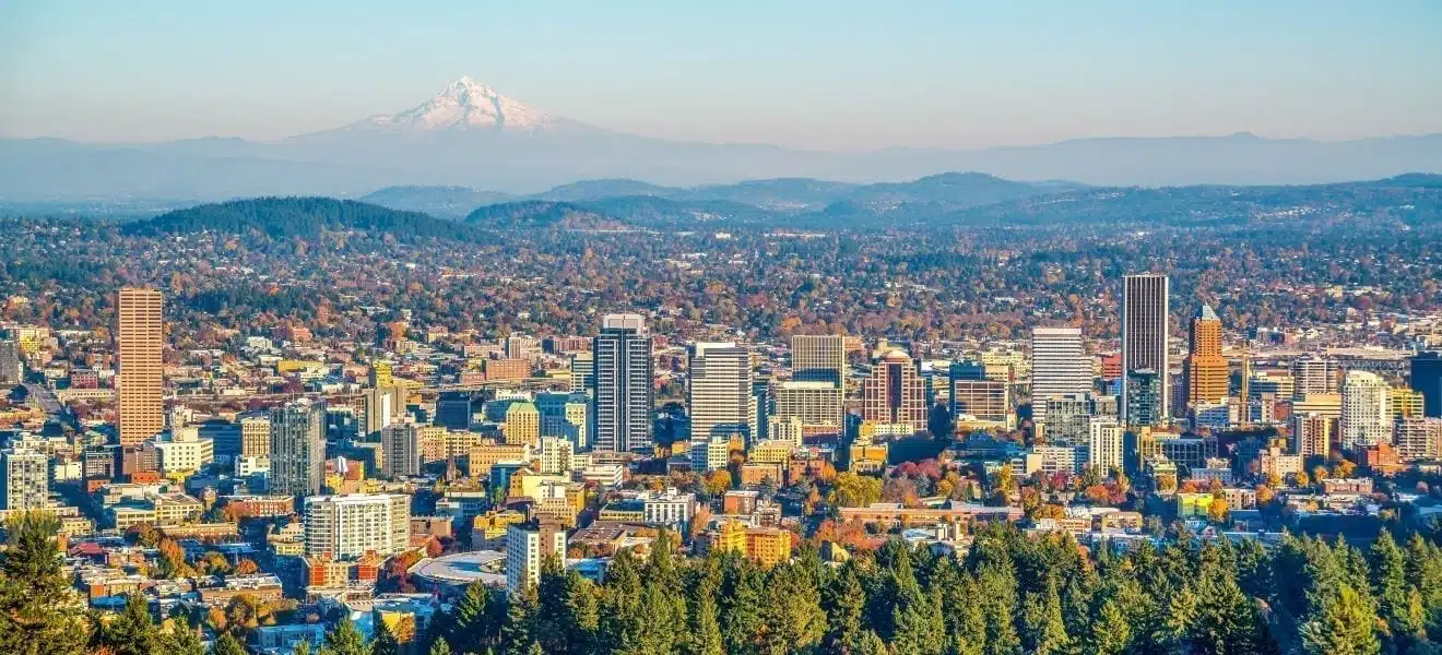 Aerial view of the Portland, Oregon, skyline with Mount Hood in the distance.