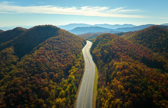 The I-40 freeway running through the Appalachian Mountains toward Asheville, North Carolina.
