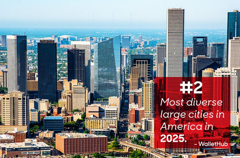 View of the Houston city skyline on a sunny day, with overlaid text that reads “#2 Most diverse large cities in America in 2025. - WalletHub.”