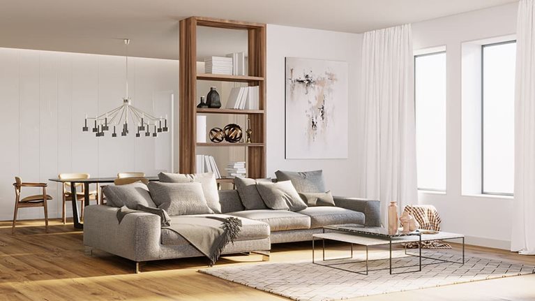 A white and beige roomed, decorated with neutral items and furniture to make it ideal for home staging