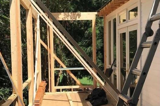 converting an outdoor deck into a home gym addition
