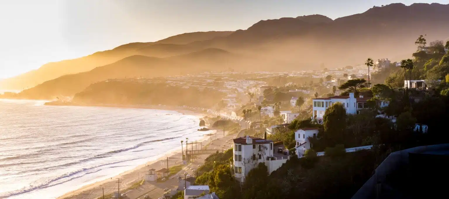 The town of Malibu, California at sunrise. The town on a cliff overlooks the ocean.