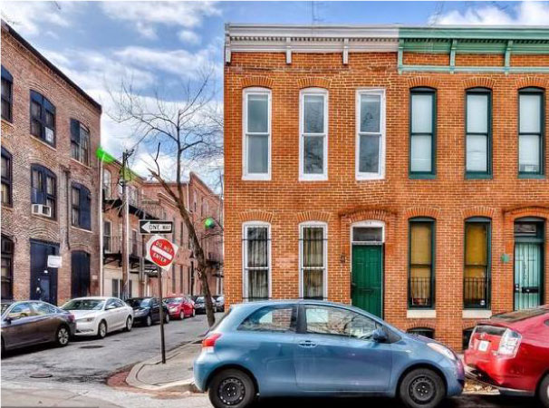 A historic brick row house in Baltimore, Maryland. 