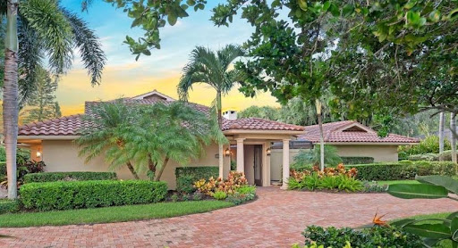 A large, single-story, Florida-style home in Sarasota.