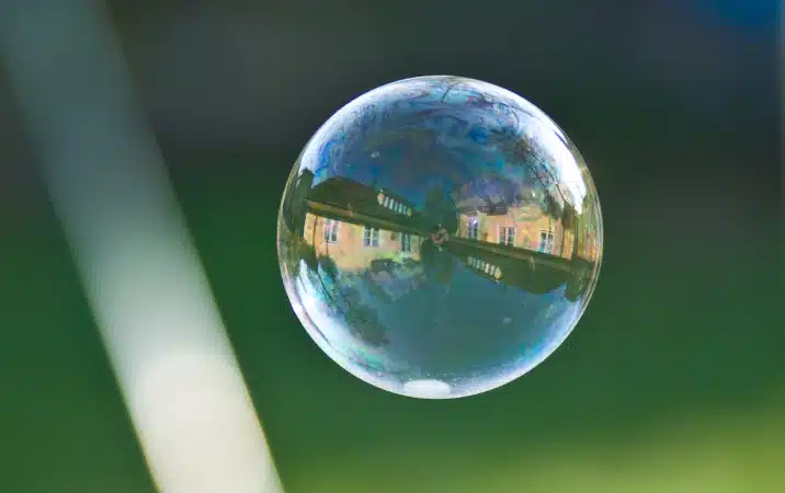reflection of a house in a bubble