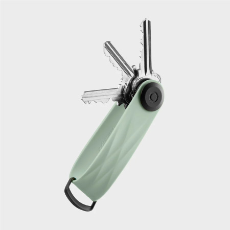  Image of a sleek  Orbitkey key organizer with three fanned out keys