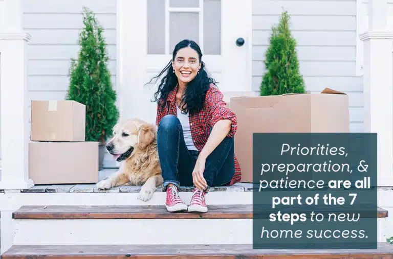 woman sitting on the porch with moving boxes