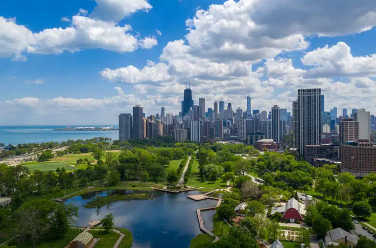 Aerial view of Lincoln Park — one of the safest neighborhoods in Chicago — with the city skyline in the background. 