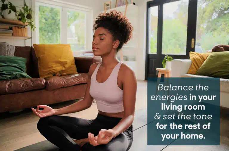 woman meditating in her living room