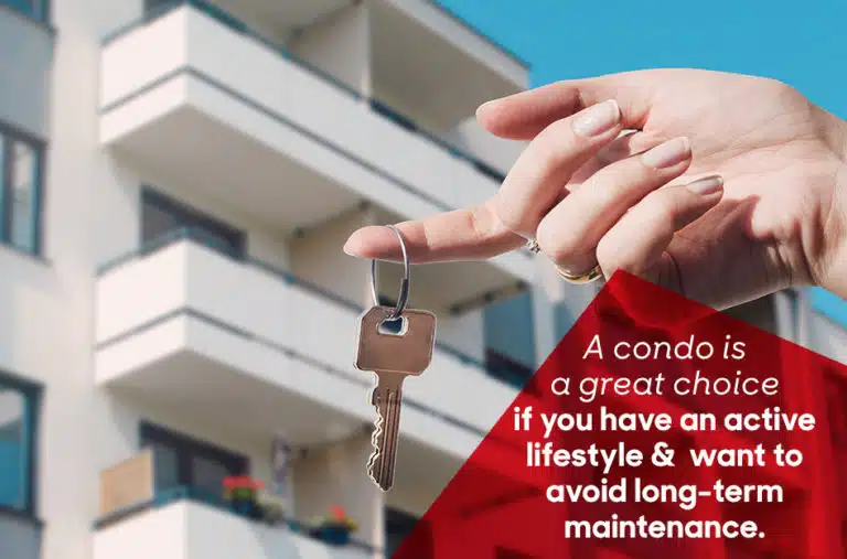 woman holding keys in front of condo building