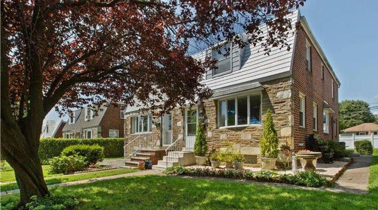 A multi-family residential home in the Academy Gardens neighborhood of Philadelphia, PA.