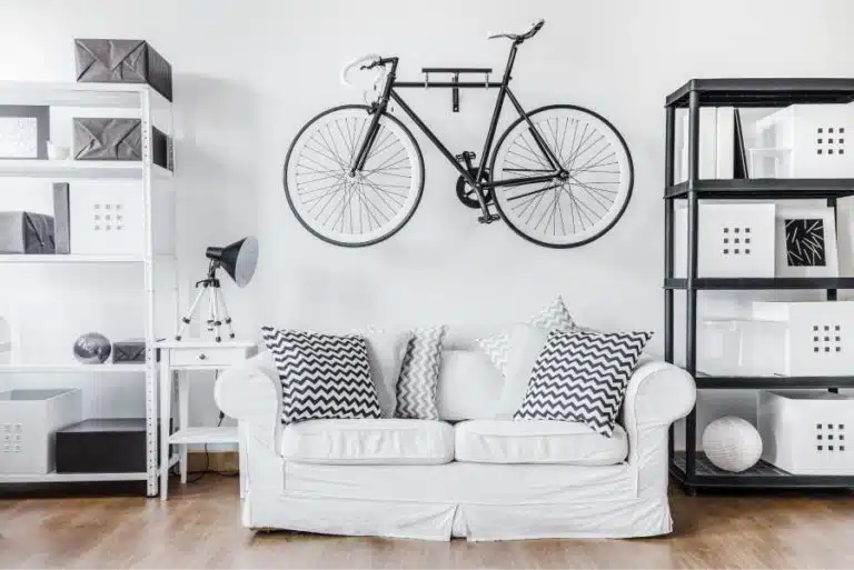 white room with shelves and hanging bike storage
