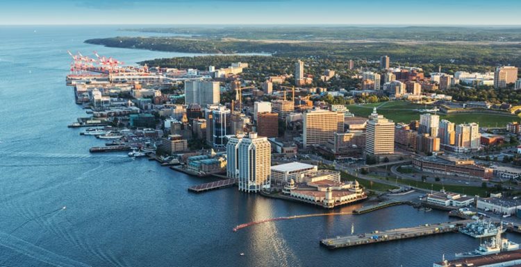 A bird's-eye view of the coastal city of Halifax, Nova Scotia, in the afternoon sun. 