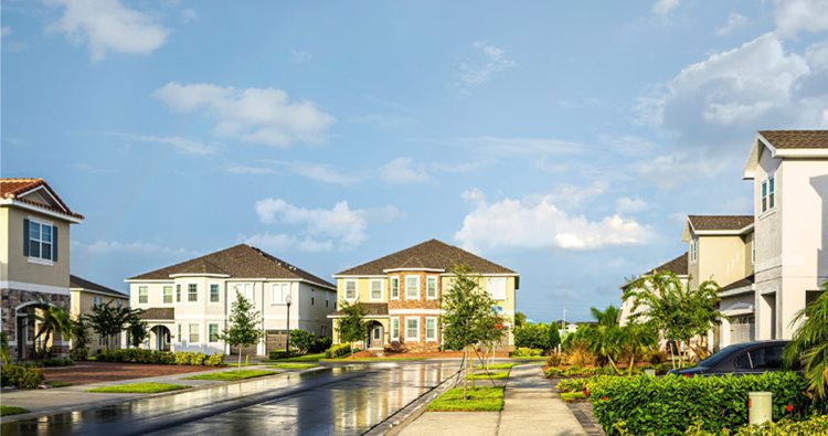 White and brown homes in an Orlando neighborhood after a rainfall