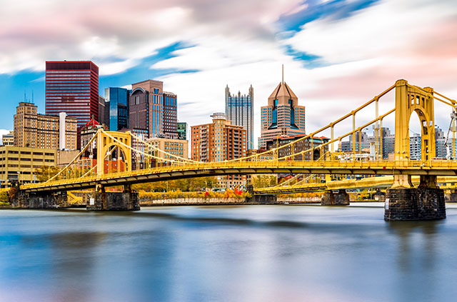 Pittsburgh PA's Roberto Clemente Bridge and downtown skyline during the day