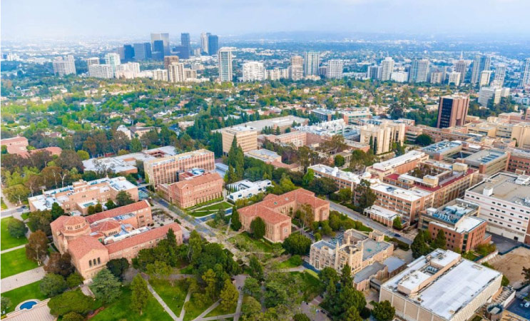 Aerial view of the UCLA University Campus in Westwood with the rest of L.A. sprawling out in the background.