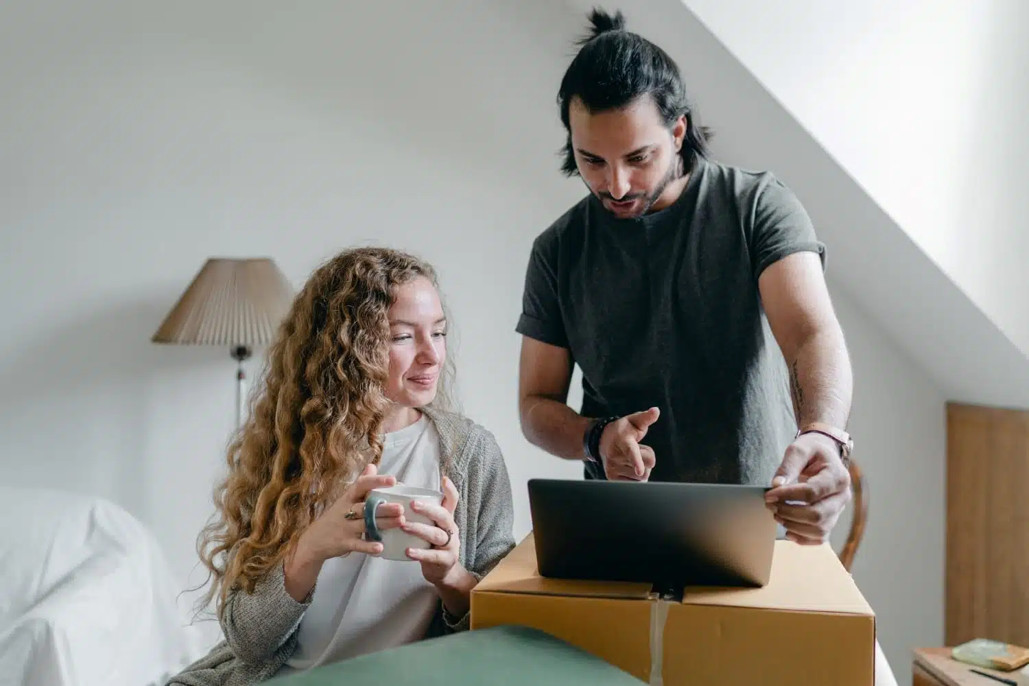 couple doing moving research online