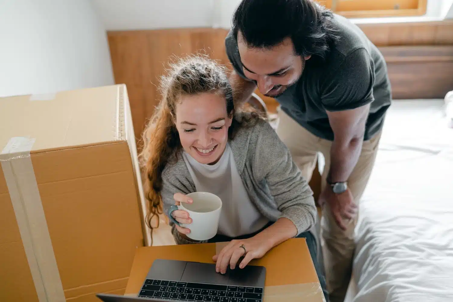couple moving looking online