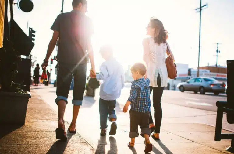 A family walking down the street in Los Angeles