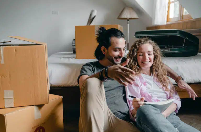 A couple using a checklist to prepare for their out-of-state move