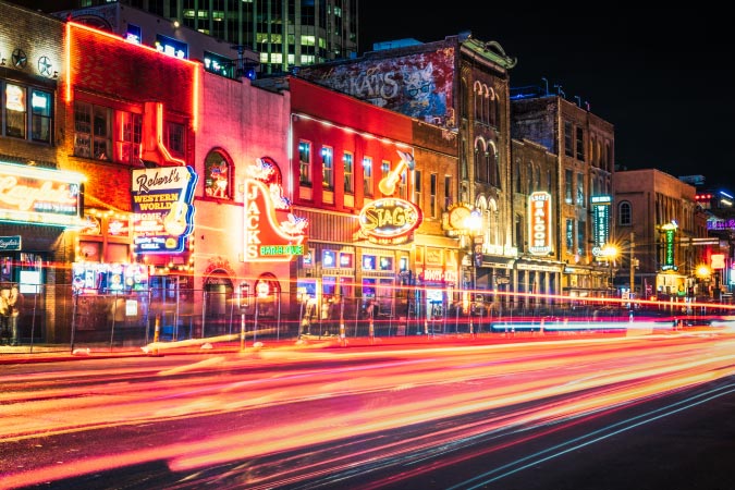 Bright lights and signs adorn the bars and businesses in Nashville’s Lower Broadway. 