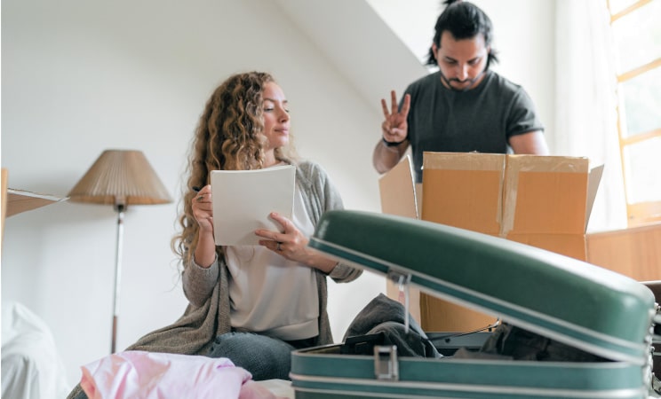 A couple making sure they've packed all of their essentials for the week of their move