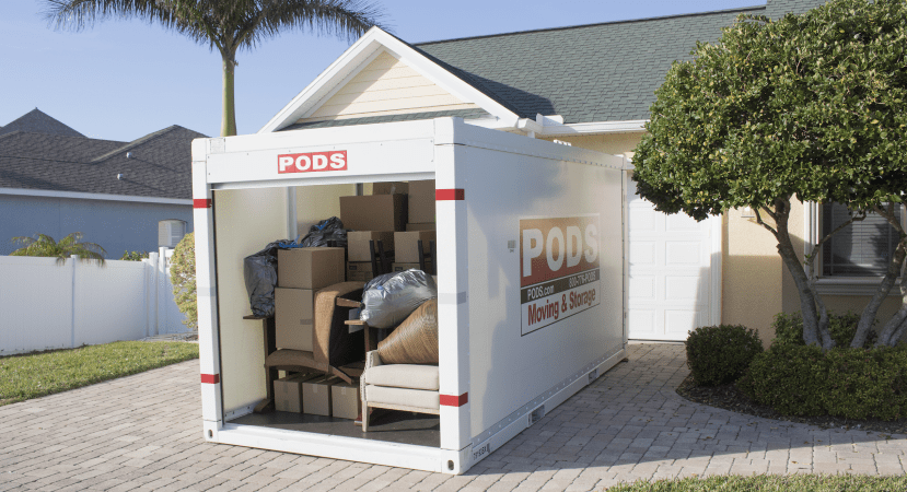 PODS Moving & Storage container packed up in the driveway.