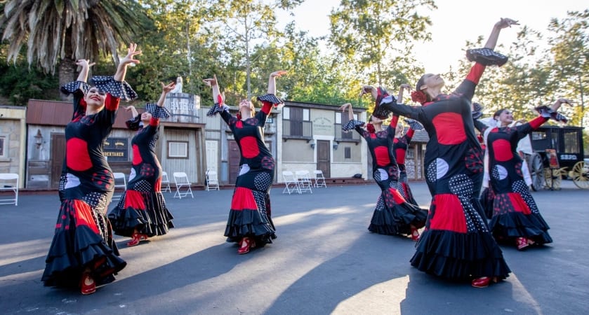 Dancers in matching dresses perform at the Old Spanish Days - Fiesta celebration in Santa Barbara, California.