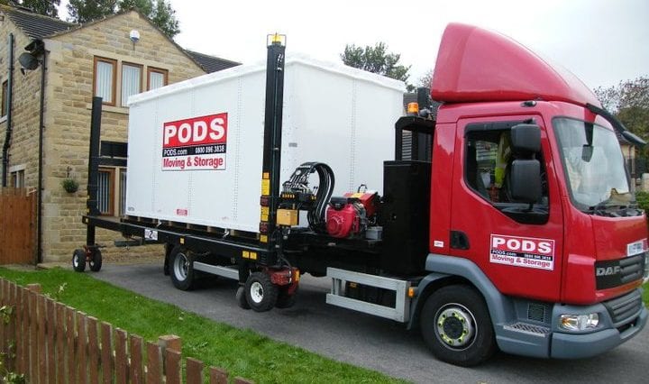 PODS portable container being unloaded from truck