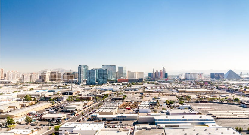 The Las Vegas skyline and strip seen from Summerlin on a hot, bright day.