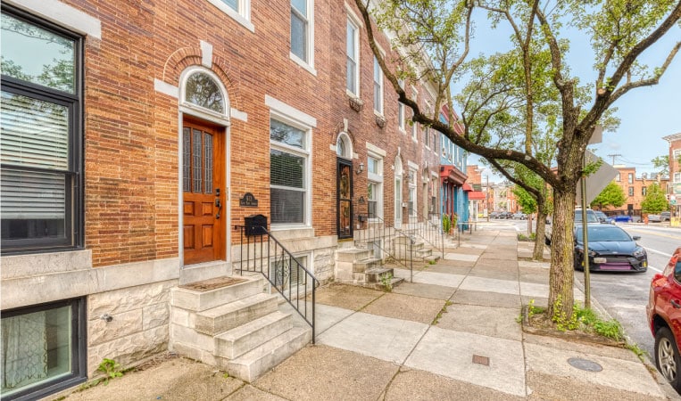 Red brick townhomes in the Riverside neighborhood of Baltimore, Maryland.