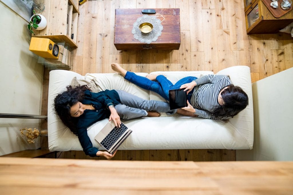 roommates sitting on a couch